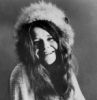 Janis Joplin seated 1970